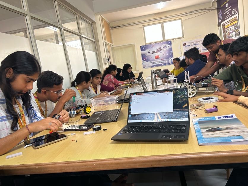 Student working on modern machine